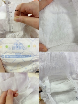 Vente en gros nouveau-née jetable molle et sèche mignonne de couche de bébé de couches-culottes