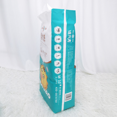 Marque des couches-culottes en gros jetables bon marché de bébé de coton magique respirable d'OEM