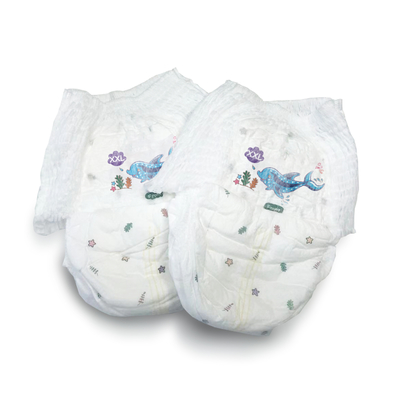La Dessus-feuille jetable adaptée aux besoins du client de coton halète le bébé d'OEM tirent vers le haut des couches-culottes