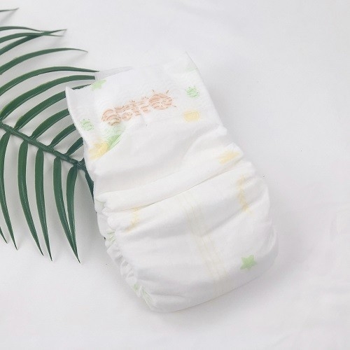 Livres vertes de bébé d'ADL 22 à 32 de client de couche-culotte couleur jetable de l'exigence